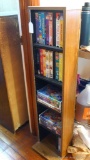 Nice little shelving unit that holds VHS tapes or books that size nicely; measures 11