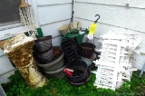 Planters, plastic garden fencing, watering cans and more; each fencing piece measures 25