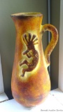 Large vase with Kokopelli on one side from Mexico; measures 10