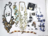 Necklaces, bracelet and earrings including some Lia Sophia pieces. Smaller bracelet was made with