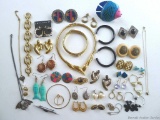 Retro necklaces, bracelets, earrings and more. Fun, fun lot. A blast from the past.