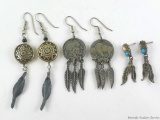 Southwestern earrings include a set with Indian head/buffalo nickel replicas. The feathers on the