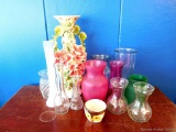 Vases of various sizes and color; tallest vase measures 8