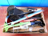 Cooking utensils including Pampered Chef Micky Mouse pancake form, spatulas, ladles and more.