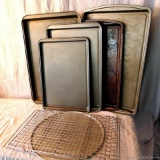 Cookie sheets, cooling racks muffin tins, loaf pans in 3 sizes and broiling pan; largest cookie