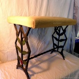 Cute little bench with metal legs and a tapestry seat with roses; measures 21