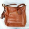 Nice leather Coach purse is 13