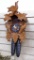 8 day cuckoo clock is marked W. Germany. Seller notes it runs a short time. Measures approx. 21