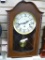 Decor wall clock comes with key and has a Westminster chime. Seller notes it runs. Case is 20