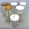 One gallon, wide mouth jars and another smaller one. Would be great for storing bulk foods, measures