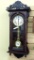 31 Day wall clock, seller notes runs. Beautiful cabinet is approx. 31'' long.