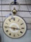 Pocket watch style wall clock is approx 19'' long and comes with key.