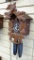 Seller notes Eight day cuckoo clock works, measures about 18'' over wooden trim and seems to be in