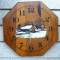 Wooden wall clock is about 9 1/2'' wide. Seller notes works.