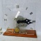 Handmade electric gear clock shows how the innards of a clock work. Measures about 14