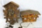 Two cuckoo clocks for parts or restoration. Log cabin type is about 10