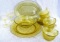 Yellow Depression glass dishes incl matching set of six teacups, four saucers, bowl, and platter;