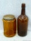 One quart brown glass bottle and an amber display jar with lid. Bottle about 11
