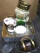 Assortment of glassware, dishes, flower pots, glasses, serving platters, and more. Pieces are in
