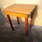Cute rustic wooden table, great for a project. Measures 28'' x 26'' x 20 1/2''.