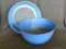 Enamel ware colander and large mixing bowl. Dishes have some paint chips with rust spotting but are