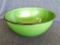 Nice green enamel ware mixing bowl. Has some ware around rim, but is in good shape. Measures 11''