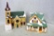 Two Department 56 Christmas village pieces. One is Mount Olivet Church, stands about 11