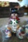 Located at alternate address in Prentice. Thomas Pacconi glass snowman figure stands 14