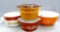 Pyrex ovenware bowl set. All are in good condition, some with covers. Largest bowl measures 8 1/2''