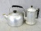 Aluminum tea kettle and coffee pitcher. Both are in decent condition but were once used as potters.