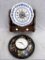 Retro Spartus plastic plate clock and a metal General Electric folk art clock. Larger about 13