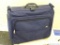 Samsonite garment bag has storage for shoes and more. Folds to 2' x 22