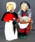 Two Byers' Choice The Carolers figures incl Woman Singing in Rain and Woman Selling Christmas Cards.