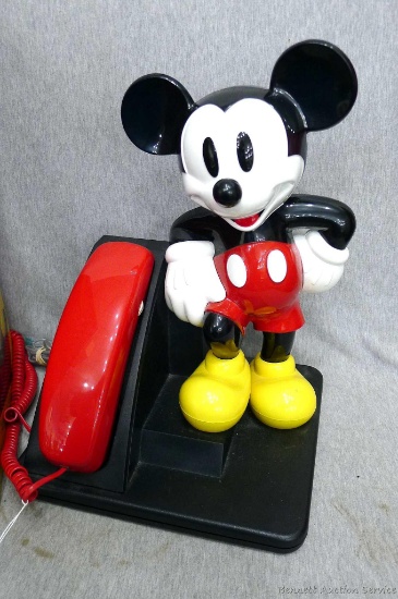 Mickey Mouse DesignLine telephone by AT&T comes with original box. Phone stands about 14" tall. All
