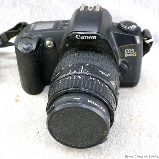 Canon E05 RebelG film camera. Needs film roll, camera is in good condition, serial no. 3012028