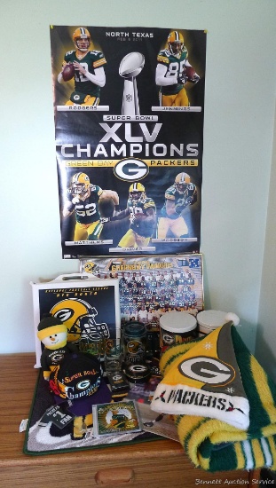 Located at alternate address in Prentice. Green Bay Packers poster, bleacher seat cushion, 20" x 30"