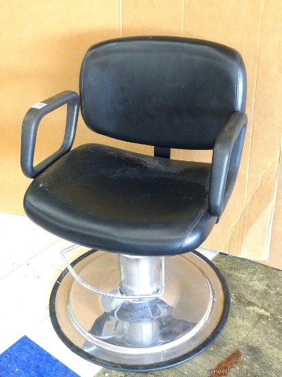Collins hydraulic barber chair. Swivels, and moves up and down. Upholstery is in good condition,