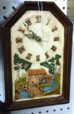 Ceramic bodied battery clock has a tag on back that notes 'Lillian Spitzbarth Rt. 3 Mineral Point,