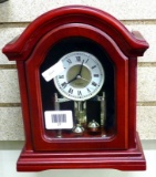 Wood cased Westminster clock with anniversary clock-style movement. Case measures 10-1/2