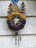 Cute little cuckoo clock is about 4-1/2