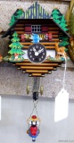 Cute little Switzerland themed clock, is about 5 1/2'' wide and in good condition.
