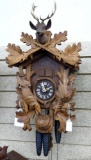 Seller notes Stag Head musical cuckoo clock runs. Face marked Germany, measures about 20'' over stag