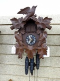 Seller notes that this German musical cuckoo clock runs. Measures about 13'' over wooden trim
