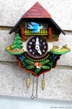Miniature clock is only about 5'' wide and one hand is detached but included. Nice piece