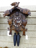 Seller notes that this clock is a 1952 cuckoo clock, measures about 13'' overall.