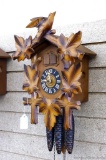 Seller notes German made musical cuckoo clock, about 13'' over trim and looks to be in good