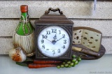 New Haven restaurant style clock, seller notes runs. Measures approx. 16'' wide
