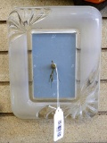 Glass front wall clock is about 8