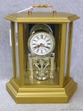 Neat quartz Anniversary clock in nice case, Seller notes works. Measures about 10