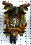 Colorful stag head hunting themed cuckoo clock looks to be in good condition. Face marked Germany.